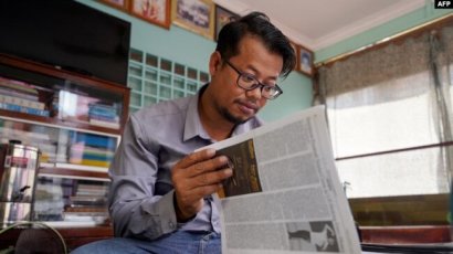 Fearful after arrest, Cambodian reporter who exposed scam centers quits media